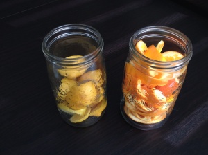 Fill the jars with the peels...lemons in one, oranges in the other...or you can mix them up...your choice!